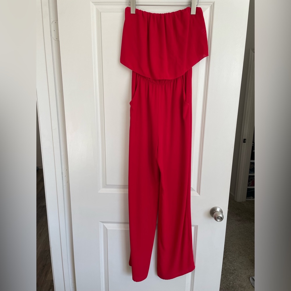 Tyche jumpsuit. Red. Size small.